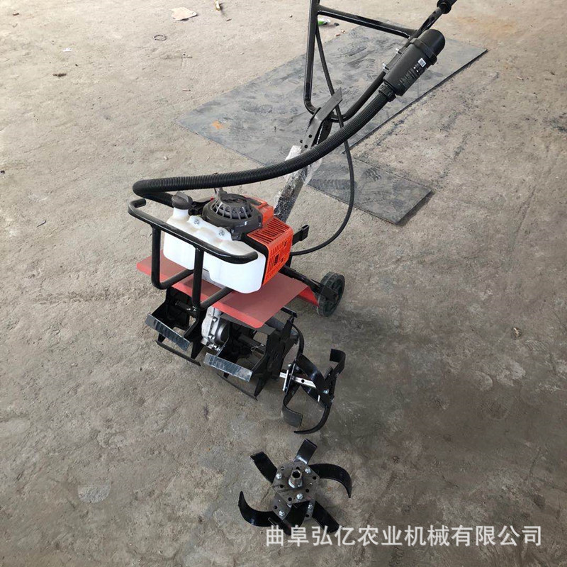 Manufacturer direct sales small gasoline rotary tiller for land reclamation, plowing machine for water and drought dual-use, pulping and loosening soil micro tiller