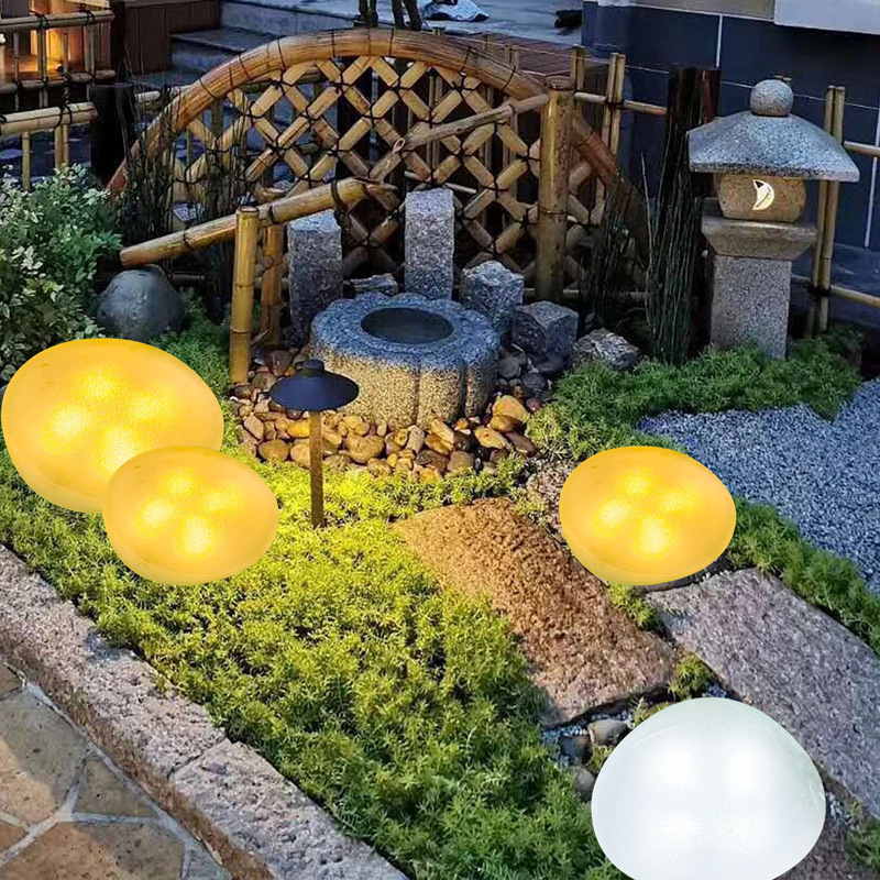Outdoor solar pebble courtyard lamp, colorful waterproof and rainproof simulation stone lamp, garden warm light decorative lamp