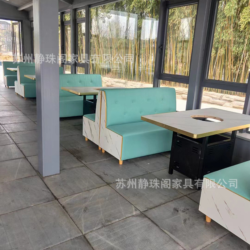 Solid wood, rock board, marble, smoke-free hot pot tables, chairs, and induction cookers integrated self-service hot pot restaurant table and chair combination