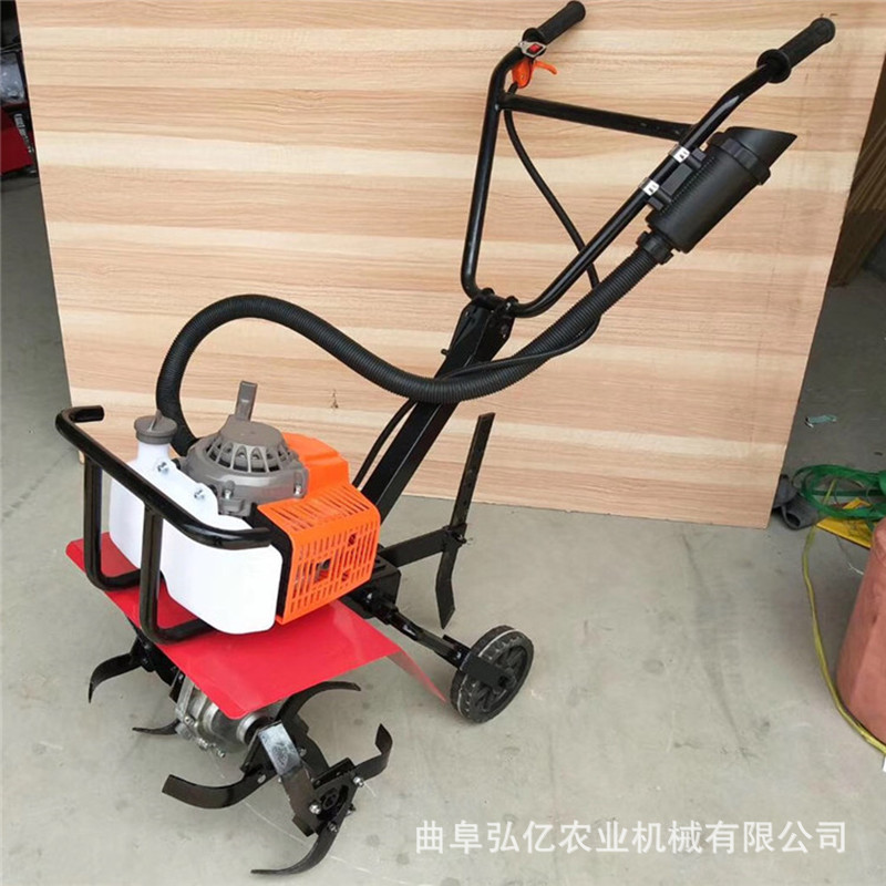 Manufacturer direct sales small gasoline rotary tiller for land reclamation, plowing machine for water and drought dual-use, pulping and loosening soil micro tiller