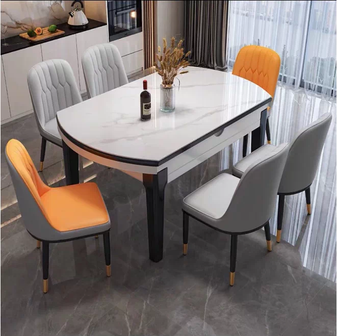 Modern minimalist and luxurious rock slab dining table and chair combination for small units, foldable and expandable round table with induction cooker function, household dining table