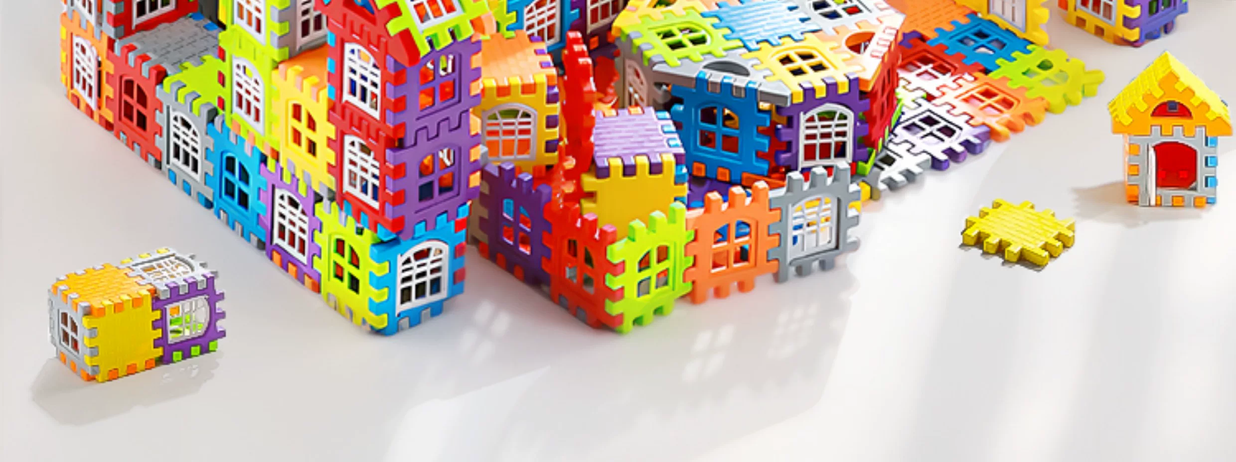 Children building houses, assembling puzzle toys with building blocks, to 6-year-old girl and boy big particle blocks, birthday gift puzzle