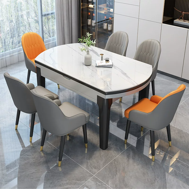 Modern minimalist and luxurious rock slab dining table and chair combination for small units, foldable and expandable round table with induction cooker function, household dining table