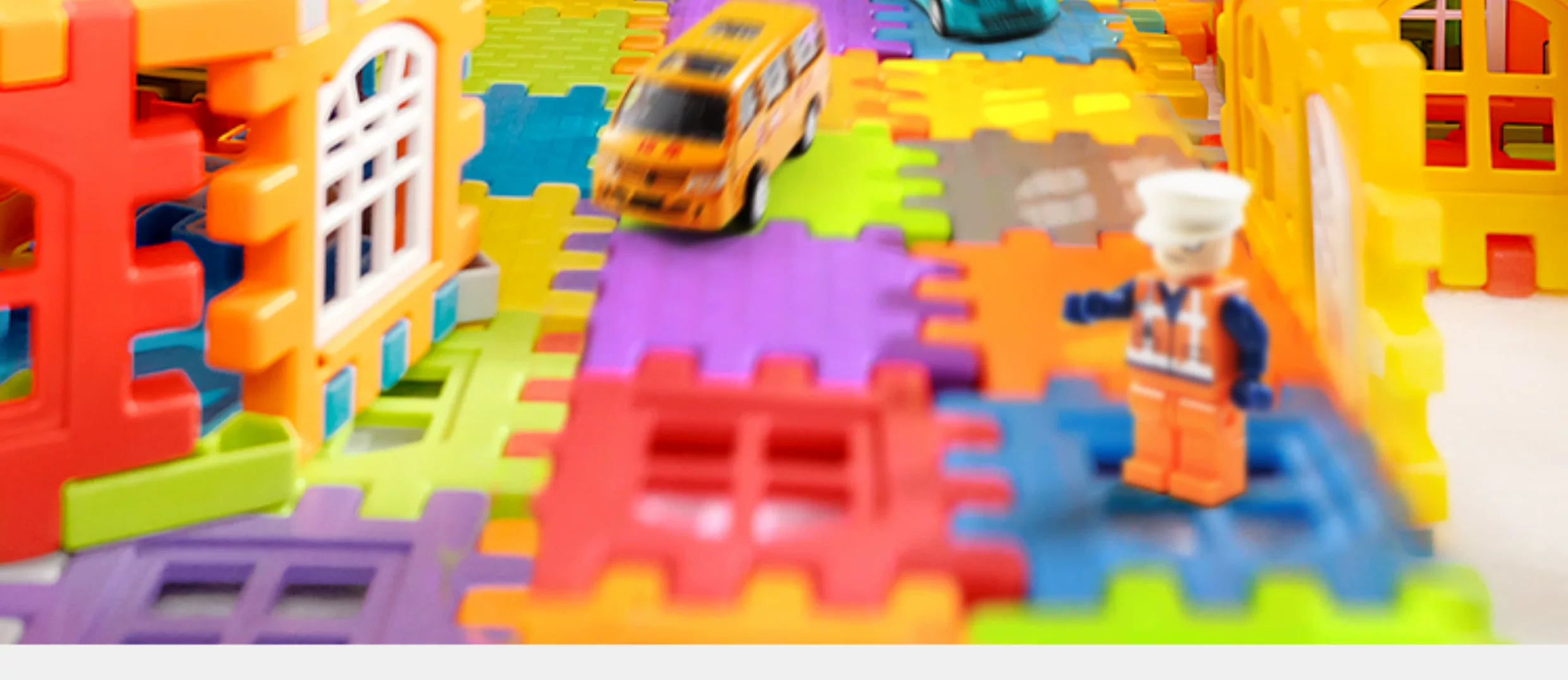 Children building houses, assembling puzzle toys with building blocks, to 6-year-old girl and boy big particle blocks, birthday gift puzzle